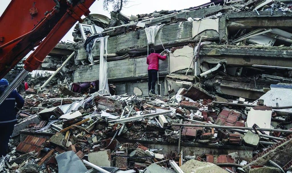 Apartment building collapsed due to the earthquake.