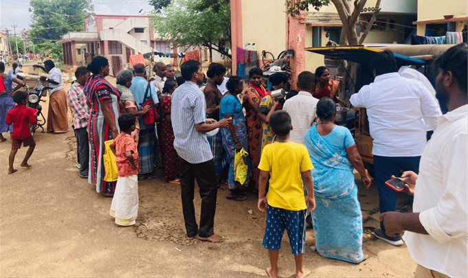 National church planter feeding children in a rural village.