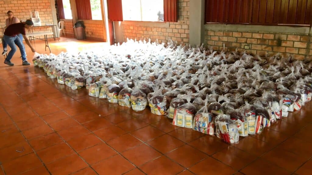 Hundreds of "Bags of Hope" food supplies lined up and ready for distribution to needy families in Honduras through the Final Frontiers Foundation's annual initiative.