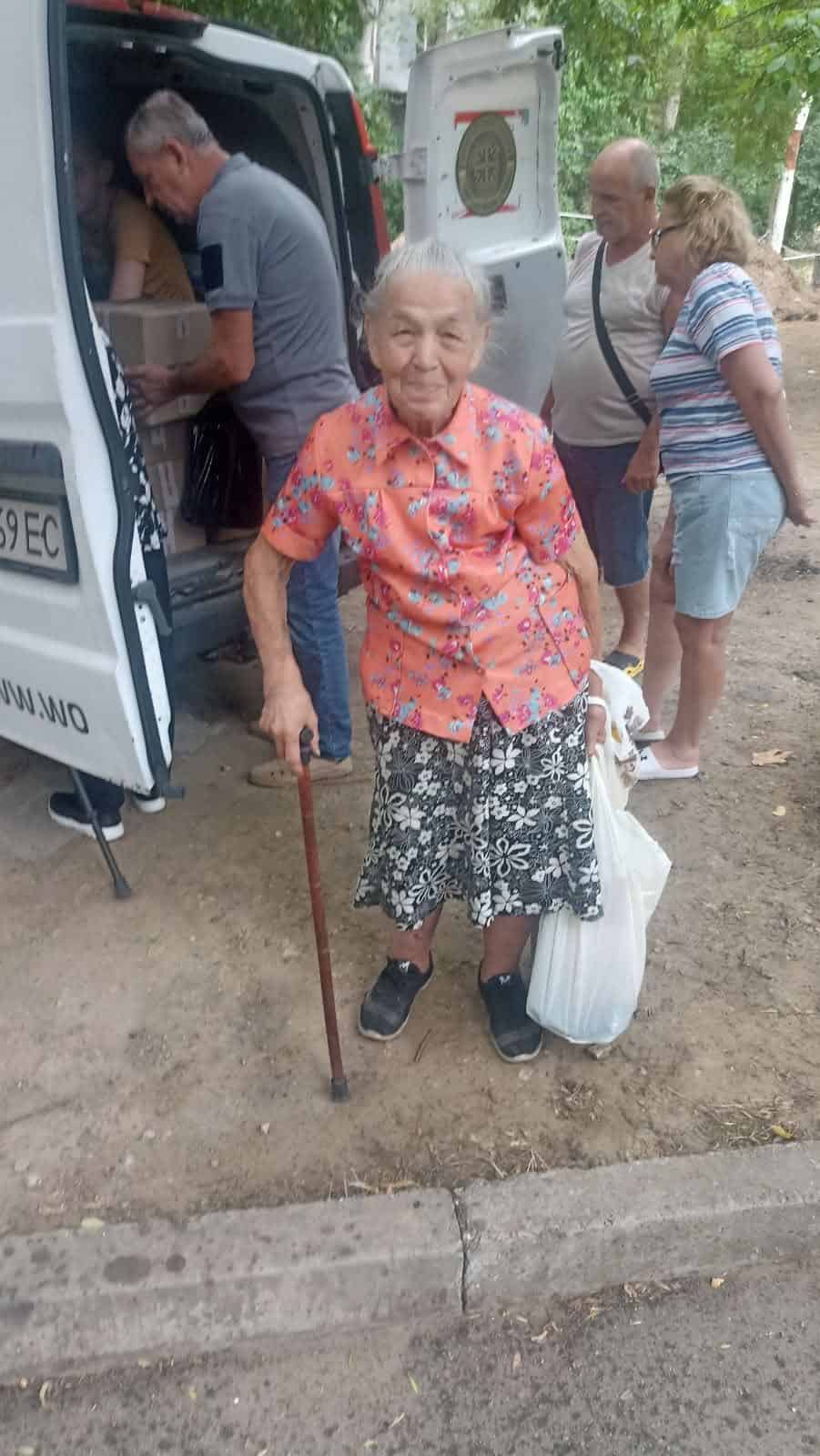 An elderly recipient of the feeding ministry's outreach.