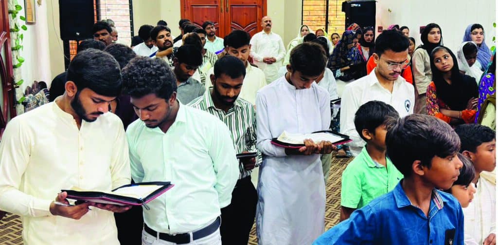 Following along in their Bibles during the preaching