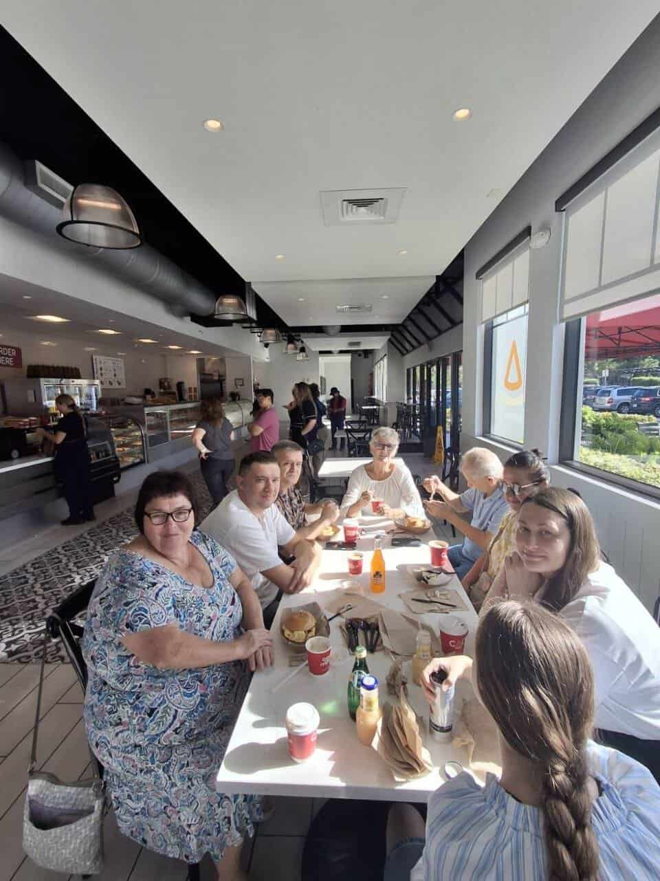 Fellowship with a partnering family during a recent outreach trip.