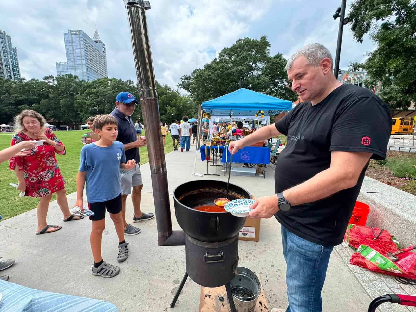 Serving traditional Ukrainian food at the Independence Day Festival to benefit the Odesa orphanage and Kyiv feeding ministries.